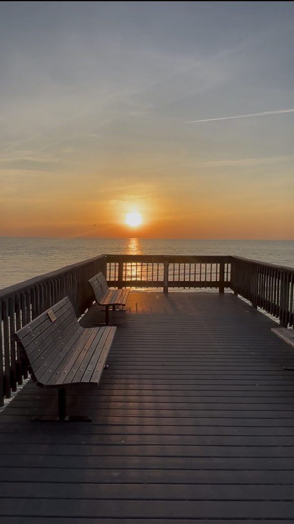North Beach Maryland boardwalk pier at sunset — waterfront lifestyle